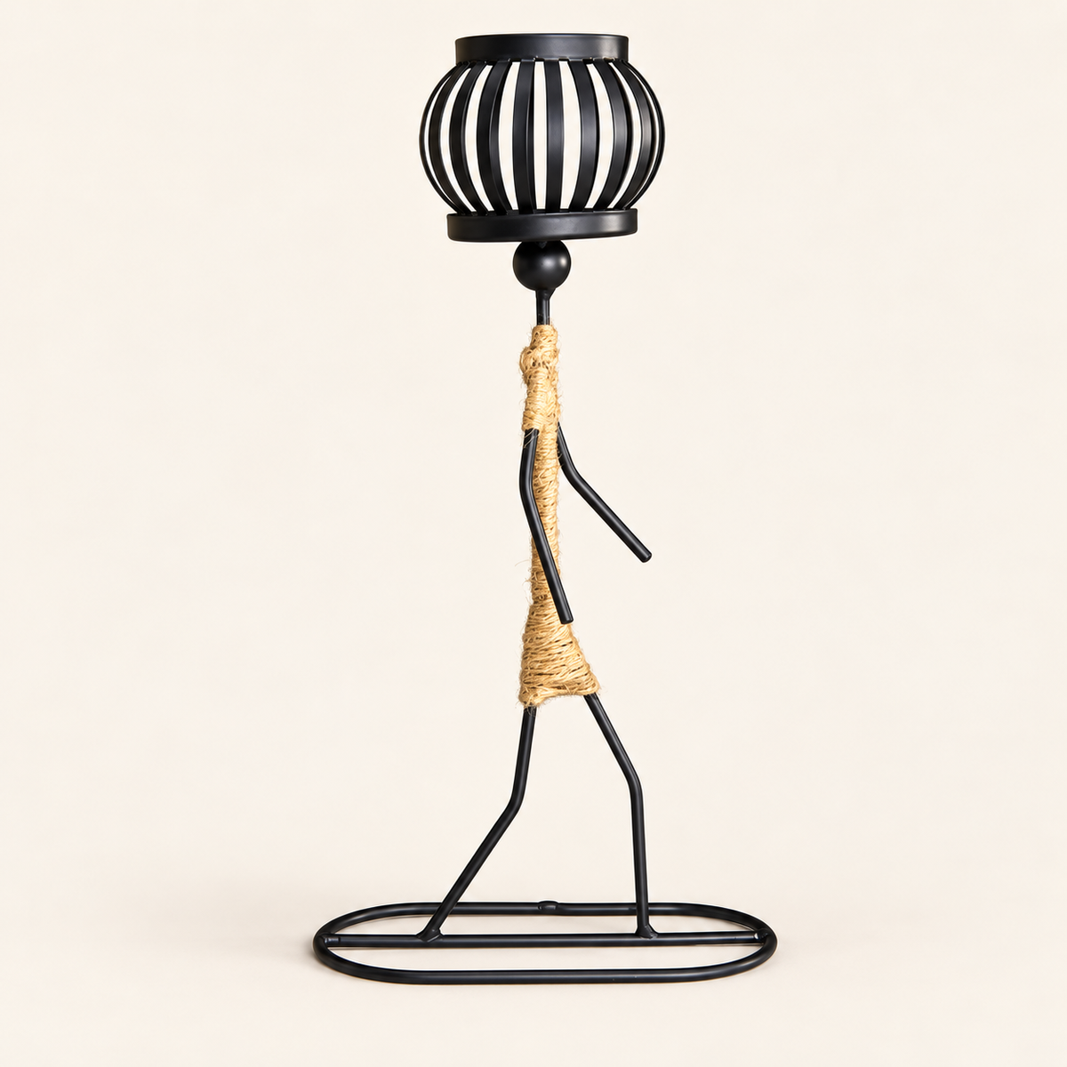 Abstract Figure Candlestick — Figure B, empty holder on a warm cream studio background