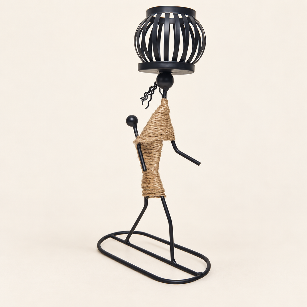 Abstract Figure Candlestick — Figure E, empty holder on a warm cream studio background
