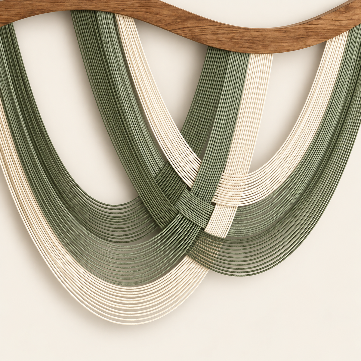 Close view of the green and cream cord bands crossing beneath the wavy wood top