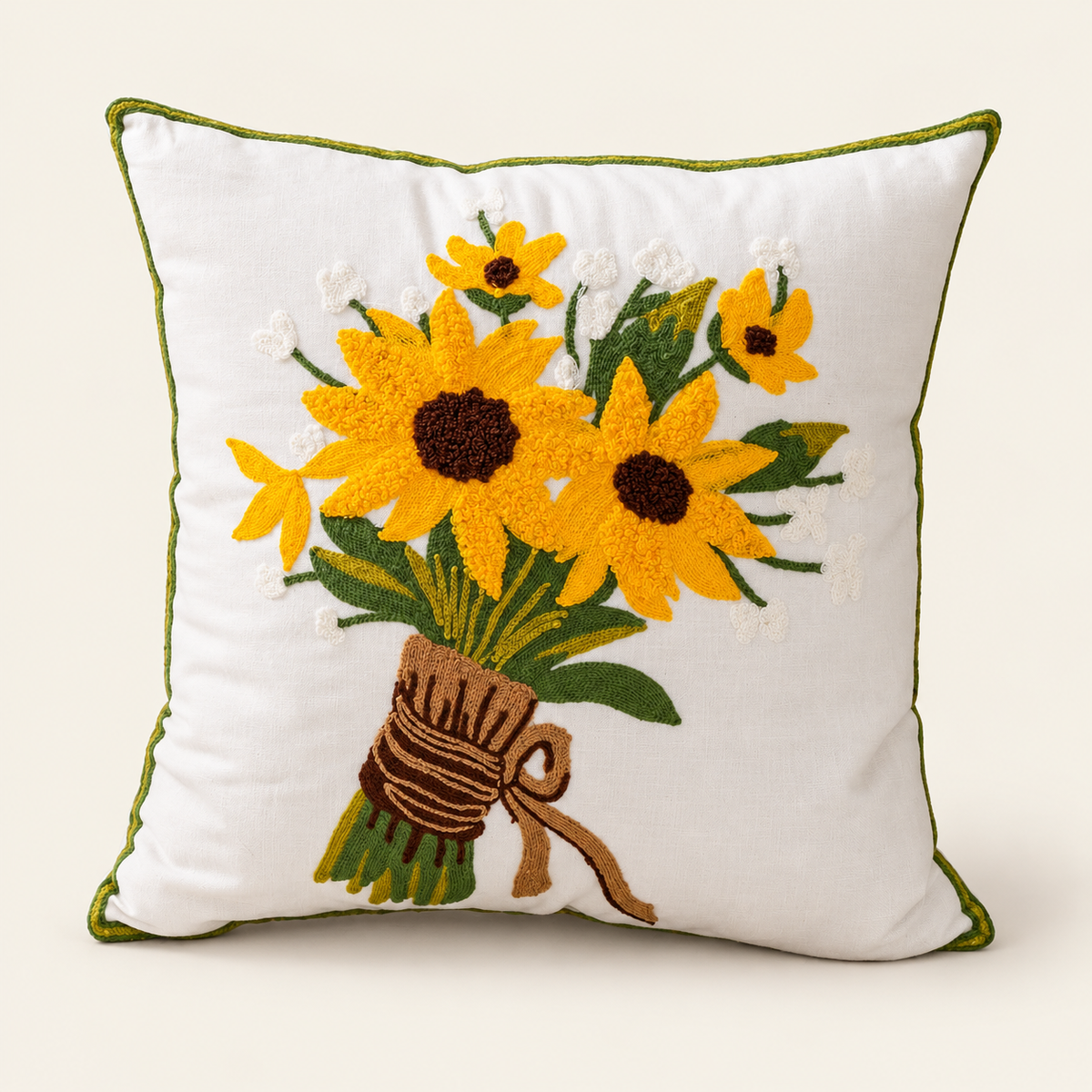 Embroidered Floral Cushion Cover — Holding flowers on a cream studio background