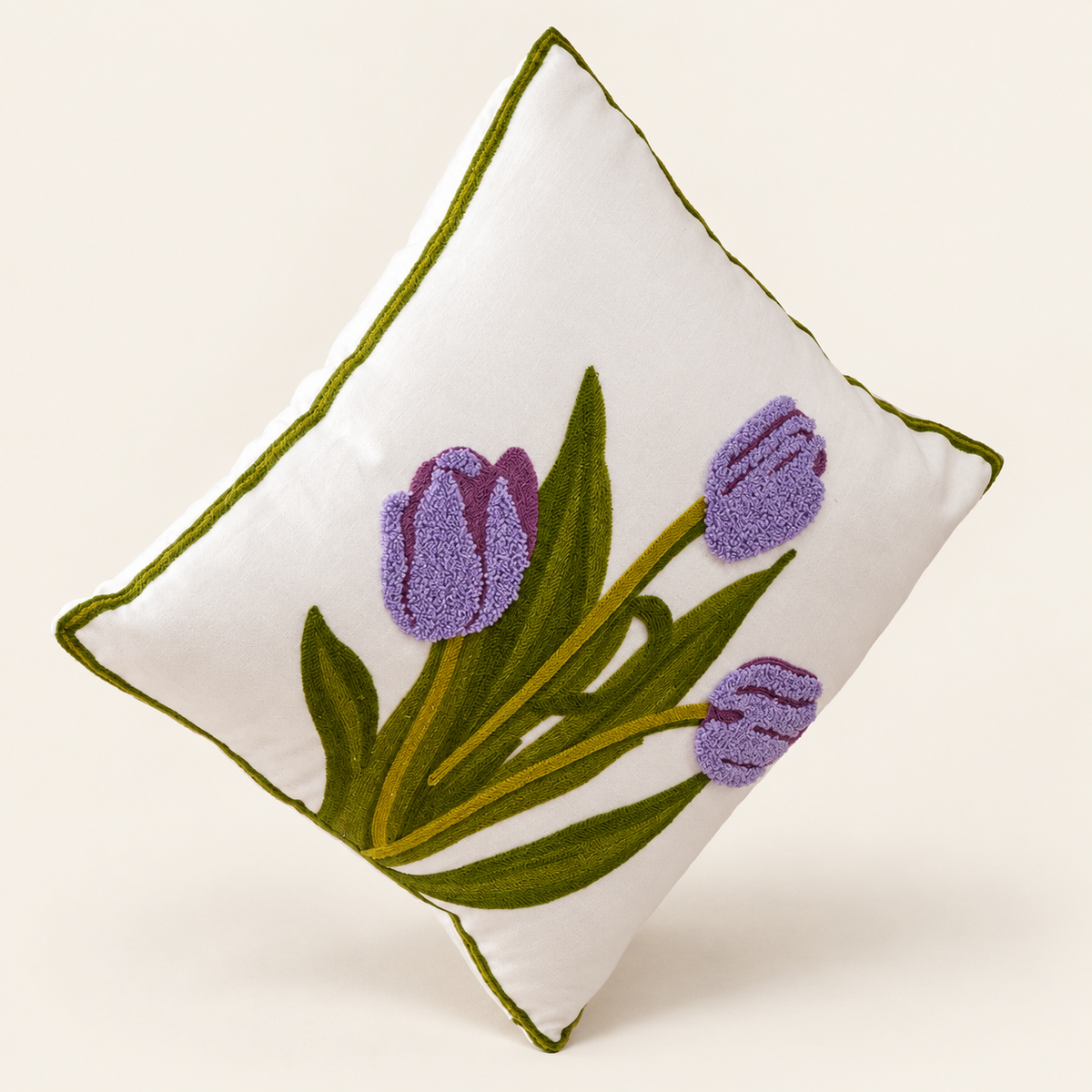 Embroidered Floral Cushion Cover — Purple tulips on a cream studio background