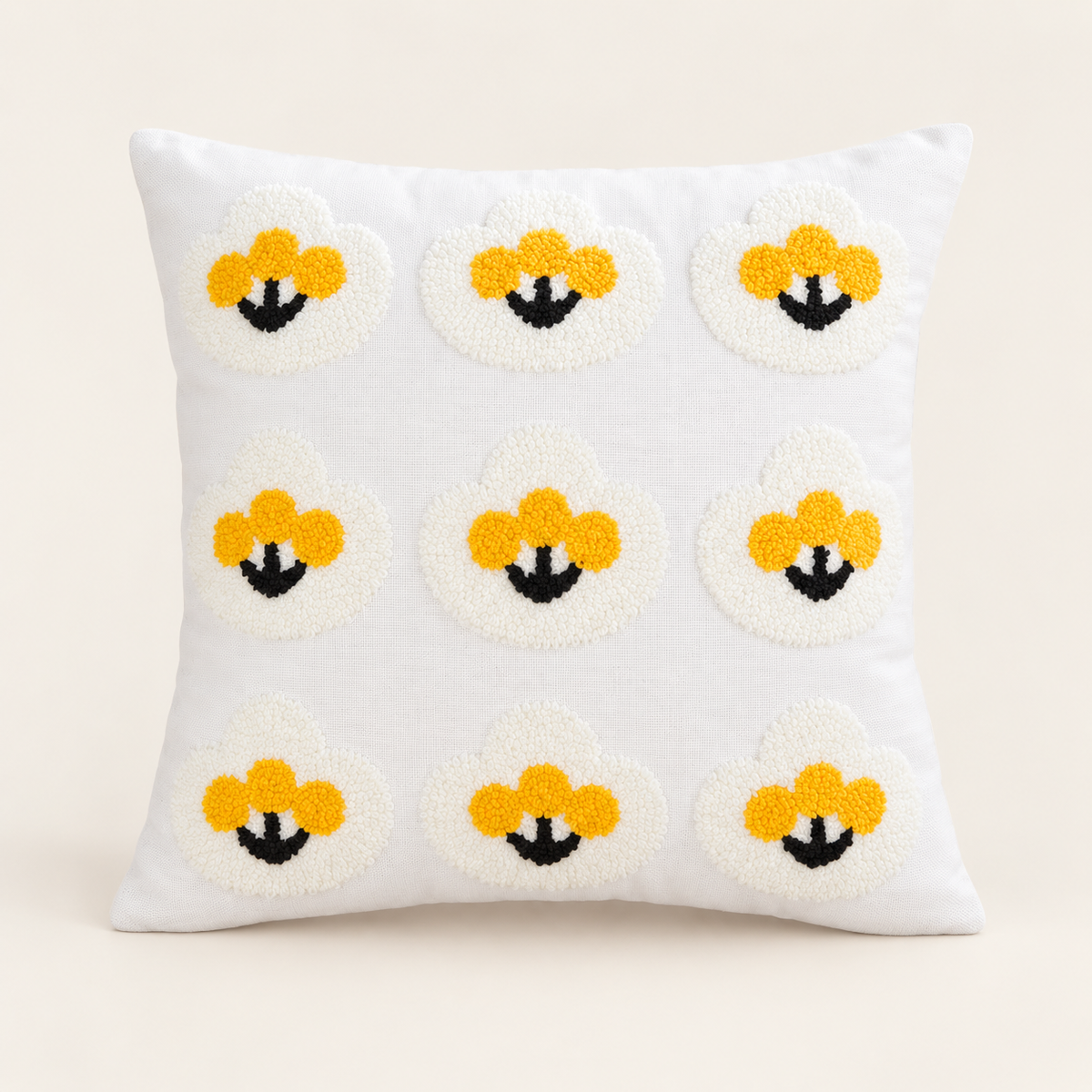 Embroidered Floral Cushion Cover — Leaves on a cream studio background