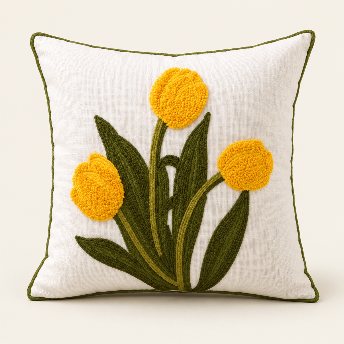Embroidered Floral Cushion Cover — Yellow tulips on a cream studio background