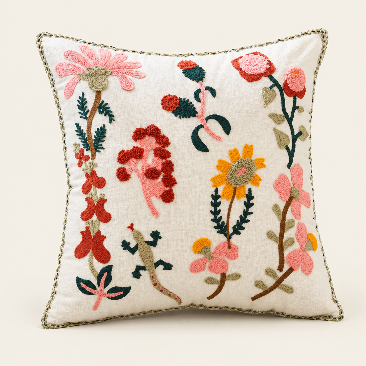 Embroidered Floral Cushion Cover — Lizard flower on a cream studio background