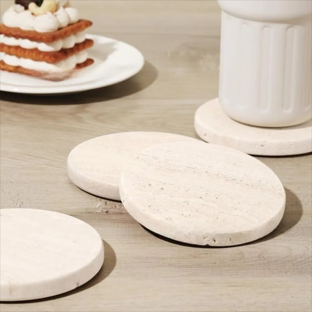Round Stone Coasters — Set of Four — table lifestyle