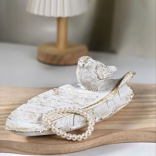 White Bird & Leaf Tray styled with a bracelet on a bedside table